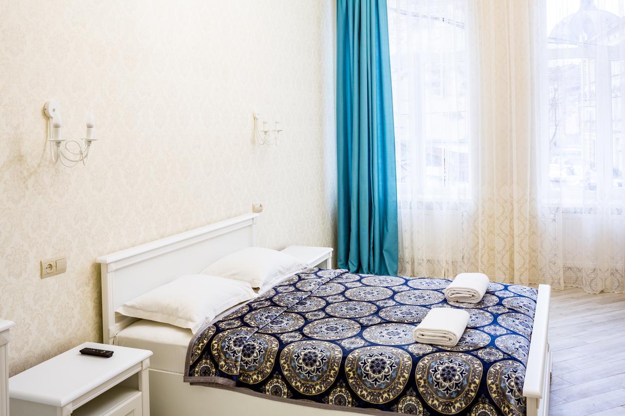 Leogrand Vip Apartments On Udatnogo 4 Львов Экстерьер фото